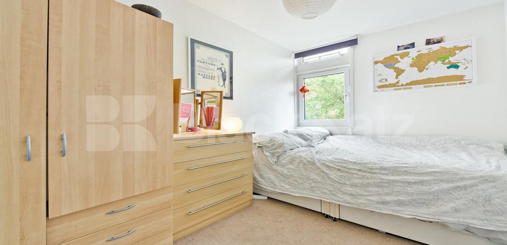 Arranged over two floors with tranquil garden Cedars Road, Clapham Common North Side